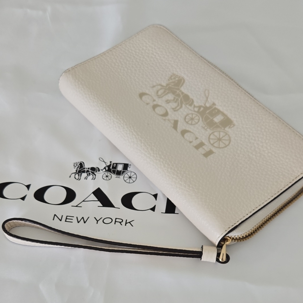 Coach Ivory Wristlet with Gold Accents